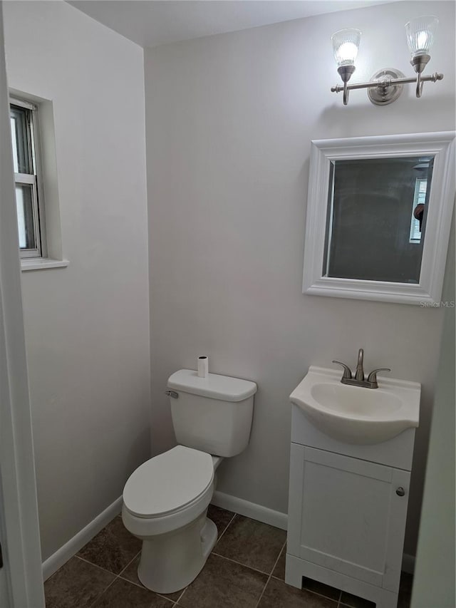 315 NE 2nd Ave, Williston, FL 32696 - half bath featuring vanity and tile patterned floors