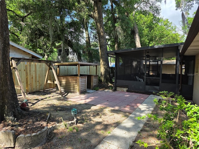 315 NE 2nd Ave, Williston, FL 32696 - view of yard featuring a sunroom