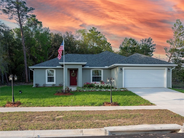2015 SW 178th Lane Rd, Ocala, FL 34473 - single story home with a garage, a lawn, stucco siding, concrete driveway, and a shingled roof