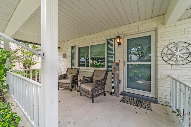 8841 SW 91st St Unit A, Ocala, FL 34481 - property entrance with a porch and stone siding