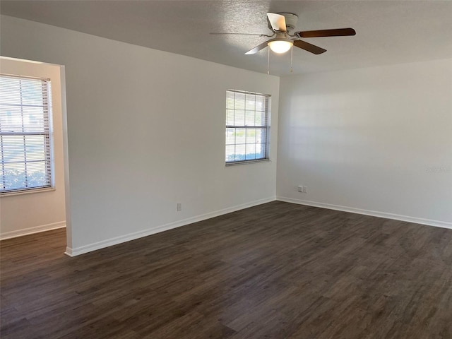 3381 NW 44th Ct, Ocala, FL 34482 - unfurnished room featuring a ceiling fan and dark wood-style flooring