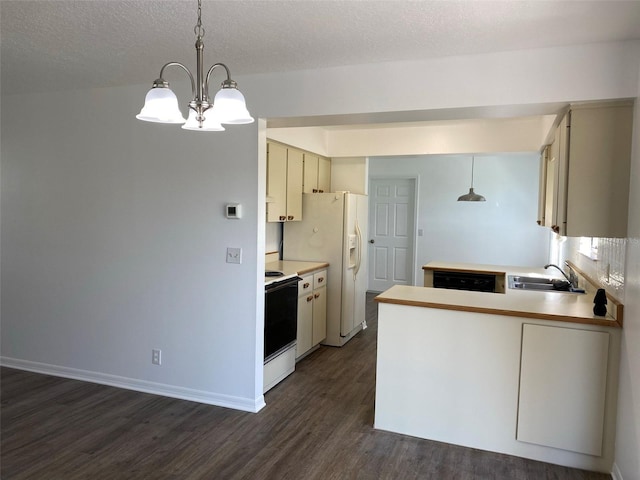 3381 NW 44th Ct, Ocala, FL 34482 - kitchen featuring range with electric stovetop, dark wood-type flooring, dishwasher, light countertops, and a chandelier