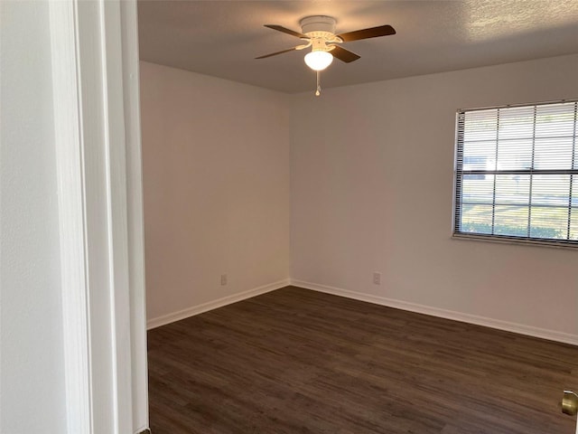 3381 NW 44th Ct, Ocala, FL 34482 - empty room with ceiling fan and dark wood-style flooring