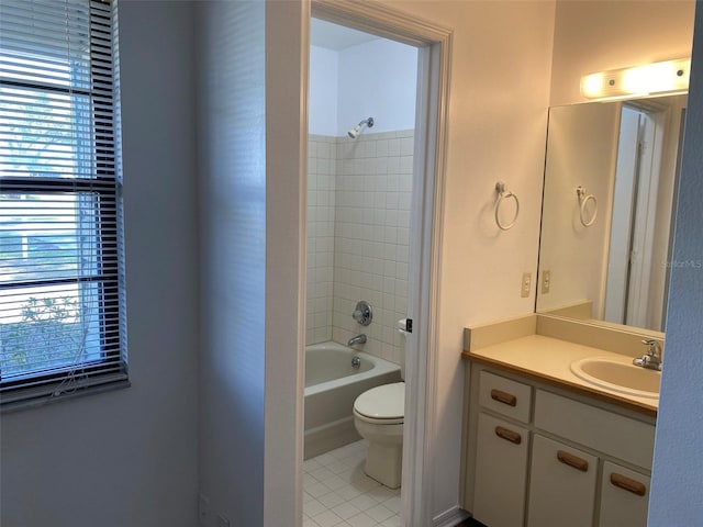 3381 NW 44th Ct, Ocala, FL 34482 - bathroom featuring healthy amount of natural light, vanity, tile patterned flooring, and  shower combination