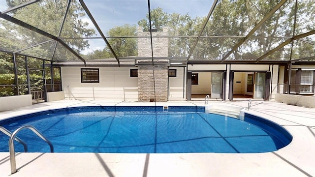 4121 SW 6th Ave, Ocala, FL 34471 - outdoor pool with a patio area and a lanai