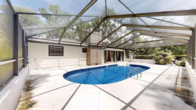 4121 SW 6th Ave, Ocala, FL 34471 - outdoor pool with a patio area and glass enclosure
