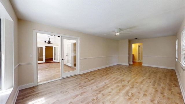 4121 SW 6th Ave, Ocala, FL 34471 - empty room featuring ceiling fan, light wood-style floors, and french doors