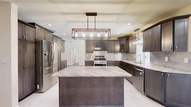 4121 SW 6th Ave, Ocala, FL 34471 - kitchen with stainless steel appliances, light marble finish flooring, light stone countertops, wall chimney range hood, and dark brown cabinetry