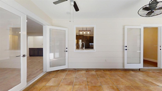 4121 SW 6th Ave, Ocala, FL 34471 - unfurnished sunroom with french doors