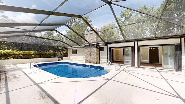 4121 SW 6th Ave, Ocala, FL 34471 - swimming pool with a patio area and glass enclosure