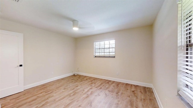 4121 SW 6th Ave, Ocala, FL 34471 - empty room with light wood-style floors and baseboards