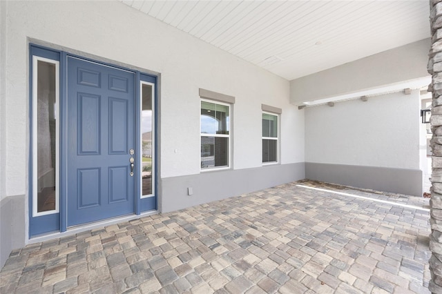 10032 SW 85th Place Rd, Ocala, FL 34481 - property entrance featuring stucco siding