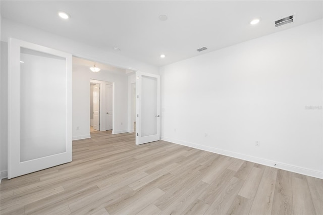 10032 SW 85th Place Rd, Ocala, FL 34481 - unfurnished bedroom featuring light wood-style floors and recessed lighting