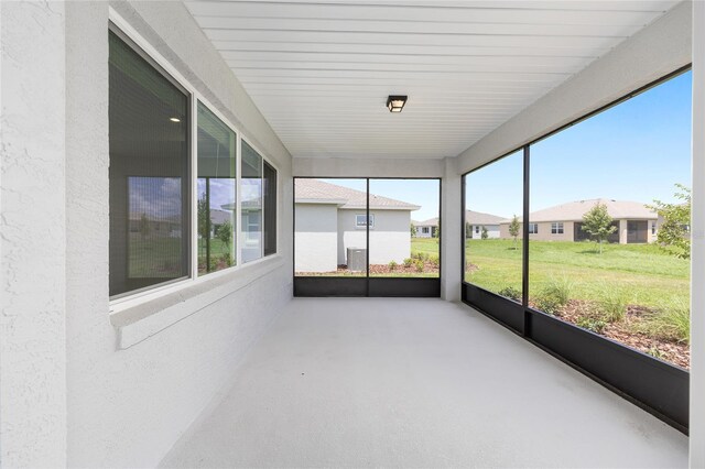 10032 SW 85th Place Rd, Ocala, FL 34481 - unfurnished sunroom featuring a residential view