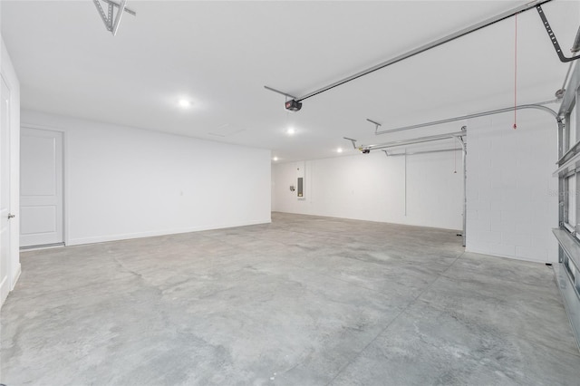 10032 SW 85th Place Rd, Ocala, FL 34481 - garage featuring a garage door opener and electric panel