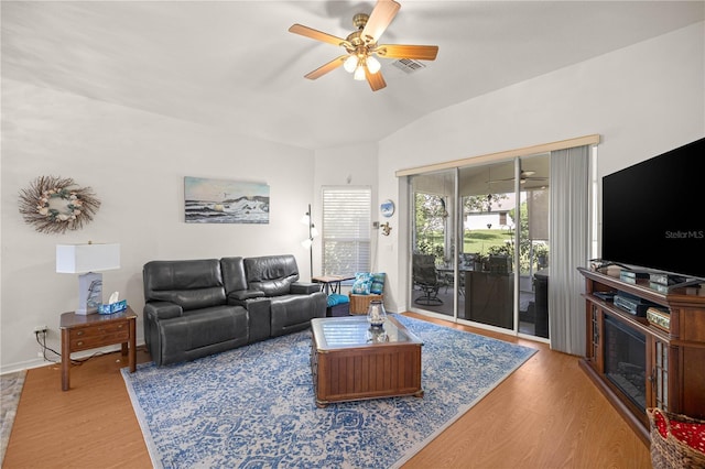 1824 W Zoe Ct, Lecanto, FL 34461 - living area featuring a ceiling fan, wood finished floors, and lofted ceiling