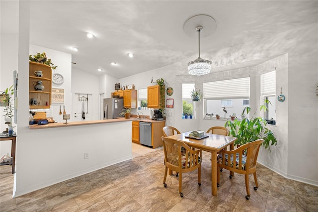 1824 W Zoe Ct, Lecanto, FL 34461 - dining space featuring vaulted ceiling and a chandelier