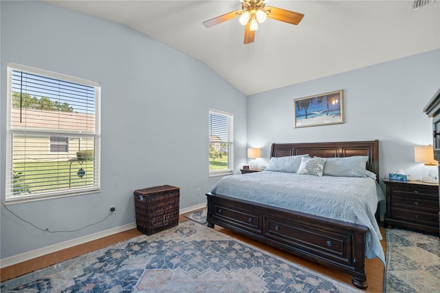 1824 W Zoe Ct, Lecanto, FL 34461 - bedroom with lofted ceiling, wood finished floors, and a ceiling fan