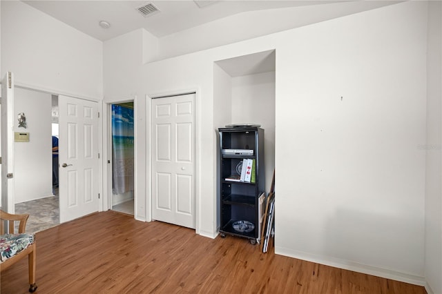 1824 W Zoe Ct, Lecanto, FL 34461 - unfurnished bedroom with light wood-type flooring and baseboards