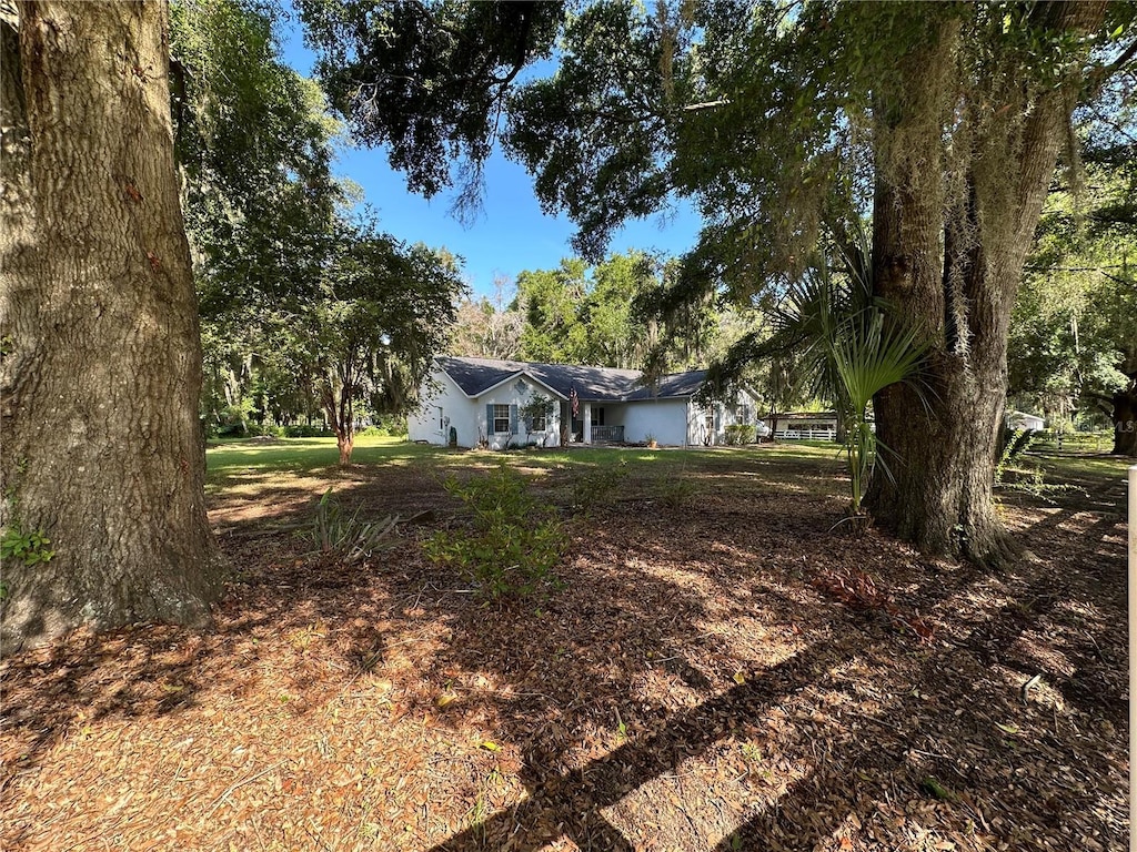 14 Count Fleet Dr, Ocala, FL 34482 - view of front facade featuring a front lawn