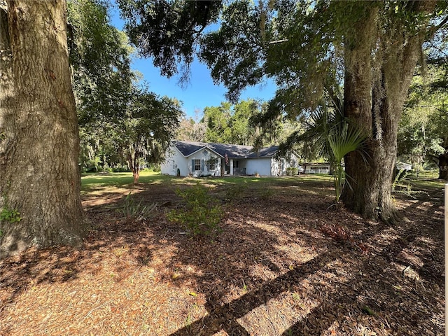 14 Count Fleet Dr, Ocala, FL 34482 - view of front facade featuring a front lawn
