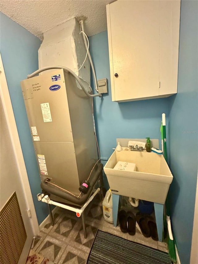 916 Jones Ave, Inverness, FL 34453 - utility room featuring a sink