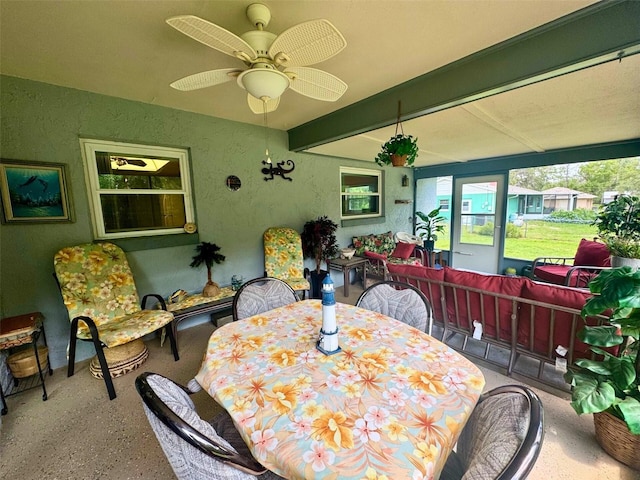 916 Jones Ave, Inverness, FL 34453 - dining area with ceiling fan, beamed ceiling, and speckle patterned floor