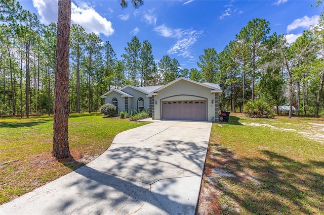 12320 SW 62nd Pl, Ocala, FL 34481 - single story home with an attached garage, driveway, stucco siding, and a front yard