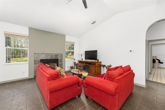 12320 SW 62nd Pl, Ocala, FL 34481 - living room featuring lofted ceiling, a fireplace, healthy amount of natural light, and ceiling fan