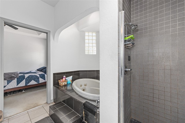 12320 SW 62nd Pl, Ocala, FL 34481 - ensuite bathroom featuring tile patterned floors, a whirlpool tub, and a stall shower