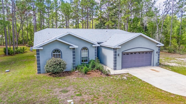 12320 SW 62nd Pl, Ocala, FL 34481 - ranch-style house featuring a garage, driveway, a front lawn, stucco siding, and a shingled roof
