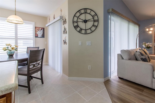 1768 SW 156th Ln, Ocala, FL 34473 - dining area with light tile patterned flooring and vaulted ceiling