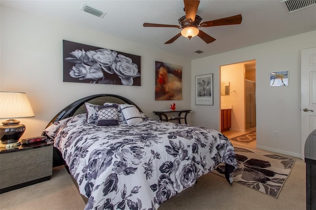 1768 SW 156th Ln, Ocala, FL 34473 - bedroom featuring light carpet, ensuite bathroom, and a ceiling fan