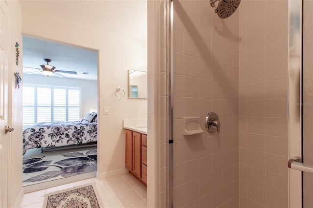 1768 SW 156th Ln, Ocala, FL 34473 - ensuite bathroom featuring a stall shower, vanity, a ceiling fan, and tile patterned flooring