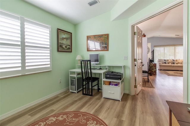 1768 SW 156th Ln, Ocala, FL 34473 - office space with vaulted ceiling and wood finished floors