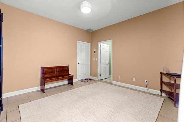 6551 SE 11th Loop, Ocala, FL 34472 - unfurnished room featuring light tile patterned floors and ceiling fan