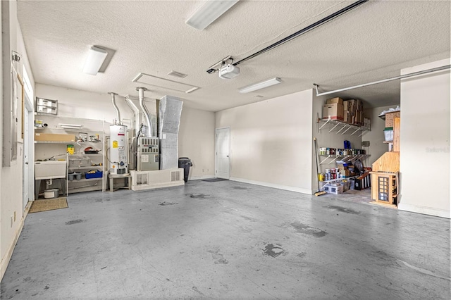 6551 SE 11th Loop, Ocala, FL 34472 - garage with water heater, a garage door opener, and heating unit