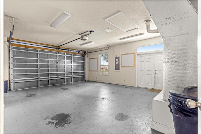 6551 SE 11th Loop, Ocala, FL 34472 - garage featuring a garage door opener and electric panel