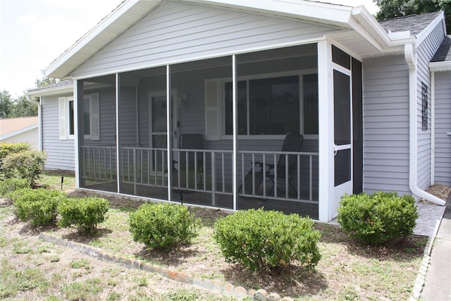 8650 SW 108th Pl, Ocala, FL 34481 - view of side of home featuring a sunroom