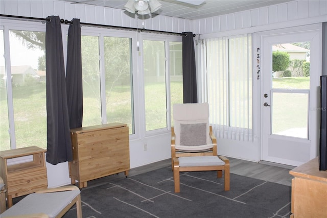 8650 SW 108th Pl, Ocala, FL 34481 - sunroom / solarium with wood finished floors, plenty of natural light, and a ceiling fan