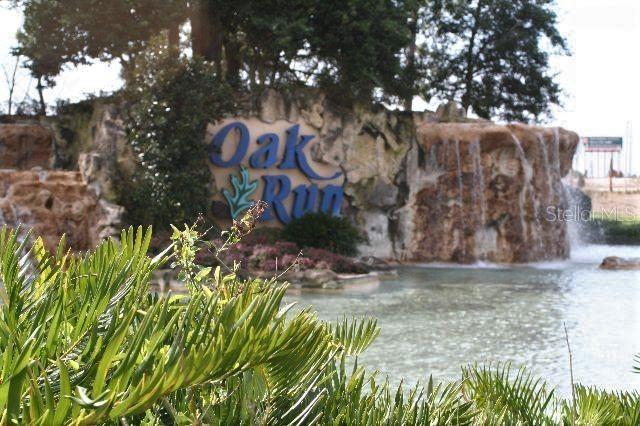 8650 SW 108th Pl, Ocala, FL 34481 - community / neighborhood sign featuring a water view