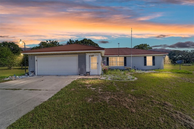 475 NE 155th Pl, Citra, FL 32113 - single story home with an attached garage, a front lawn, and concrete driveway