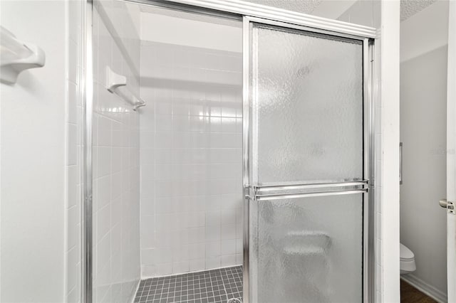 475 NE 155th Pl, Citra, FL 32113 - bathroom featuring toilet and a stall shower