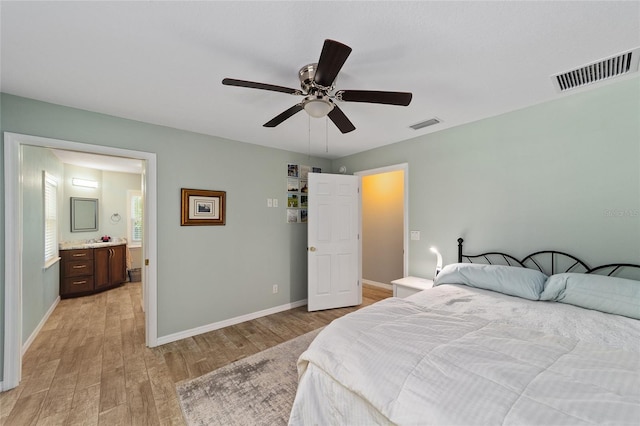 19130 NW 60th Ave, Reddick, FL 32686 - bedroom with light wood-style floors and a ceiling fan