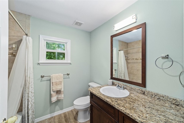 19130 NW 60th Ave, Reddick, FL 32686 - bathroom with wood finished floors and vanity