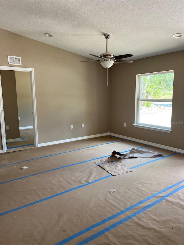 19622 SW Marine Blvd, Dunnellon, FL 34431 - spare room with a textured ceiling and a ceiling fan
