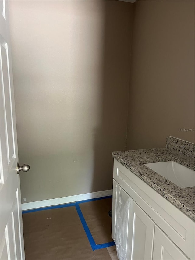 19622 SW Marine Blvd, Dunnellon, FL 34431 - bathroom featuring vanity and baseboards