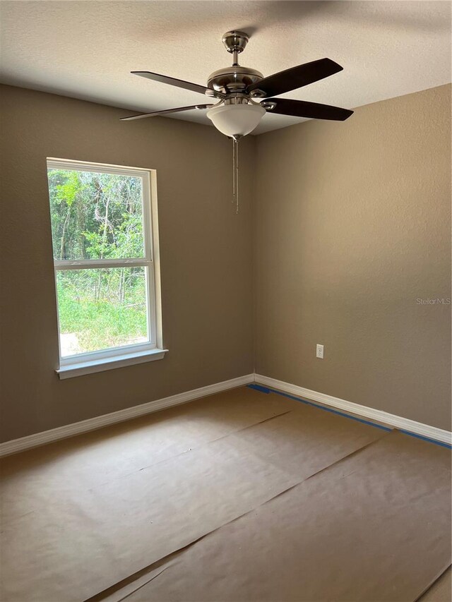 19622 SW Marine Blvd, Dunnellon, FL 34431 - spare room featuring a ceiling fan and baseboards