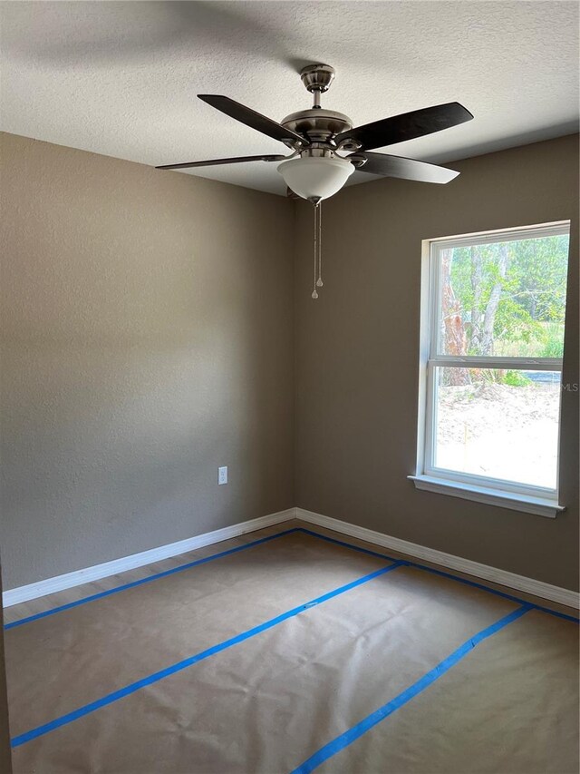 19622 SW Marine Blvd, Dunnellon, FL 34431 - unfurnished room with a ceiling fan and a textured ceiling