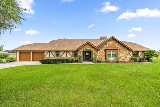 12131 NE 10th Ter, Ocala, FL 34479 - view of front of house with stone siding, an attached garage, stucco siding, a chimney, and a front lawn